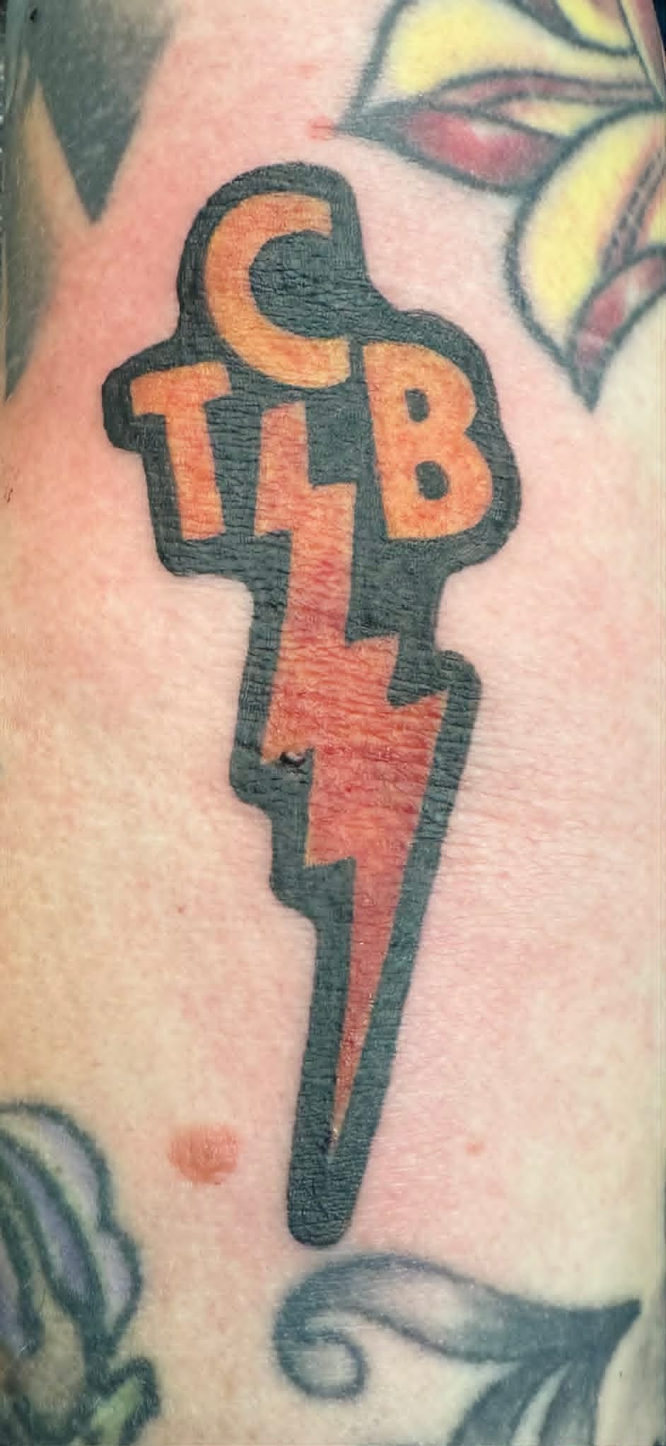 Custom illustrative design tattoo by John Quinn at Tattoo Zone Newcastle.