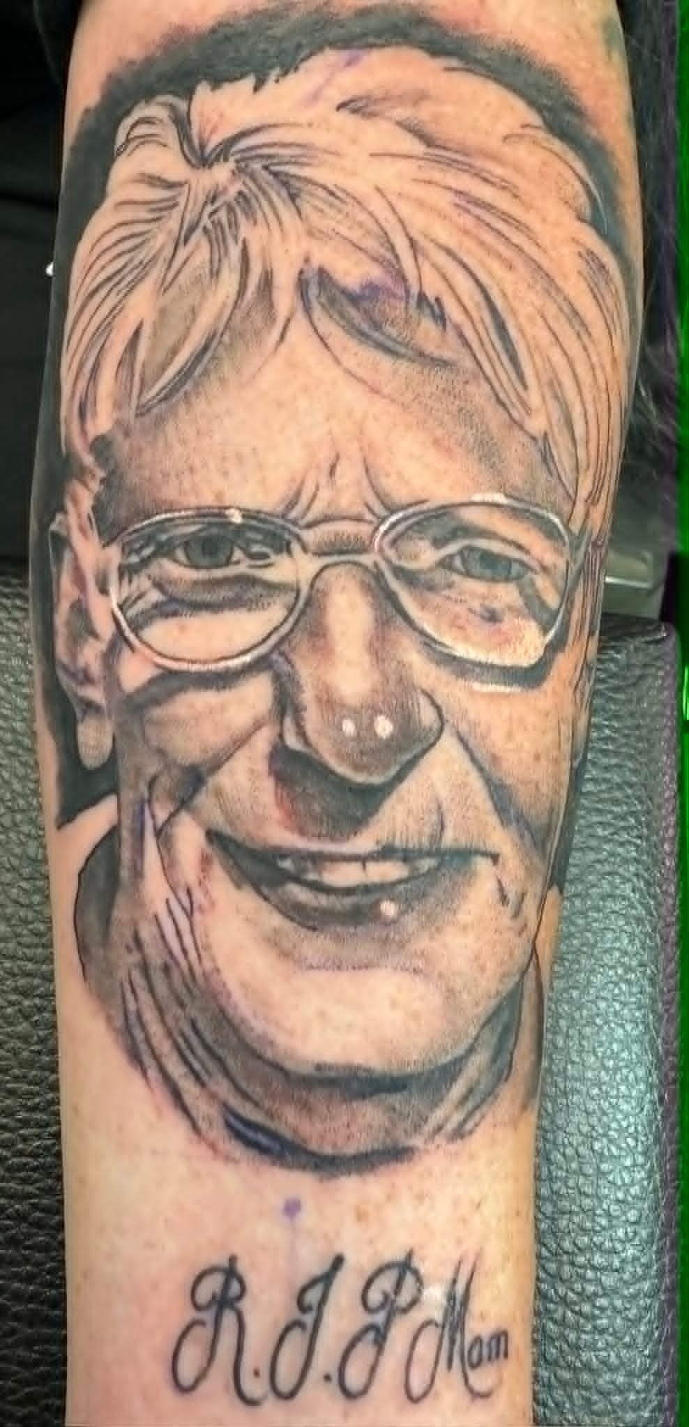 Black and grey realism grandfather memorial portrait arm tattoo by John Quinn at Tattoo Zone, tattoos Newcastle.