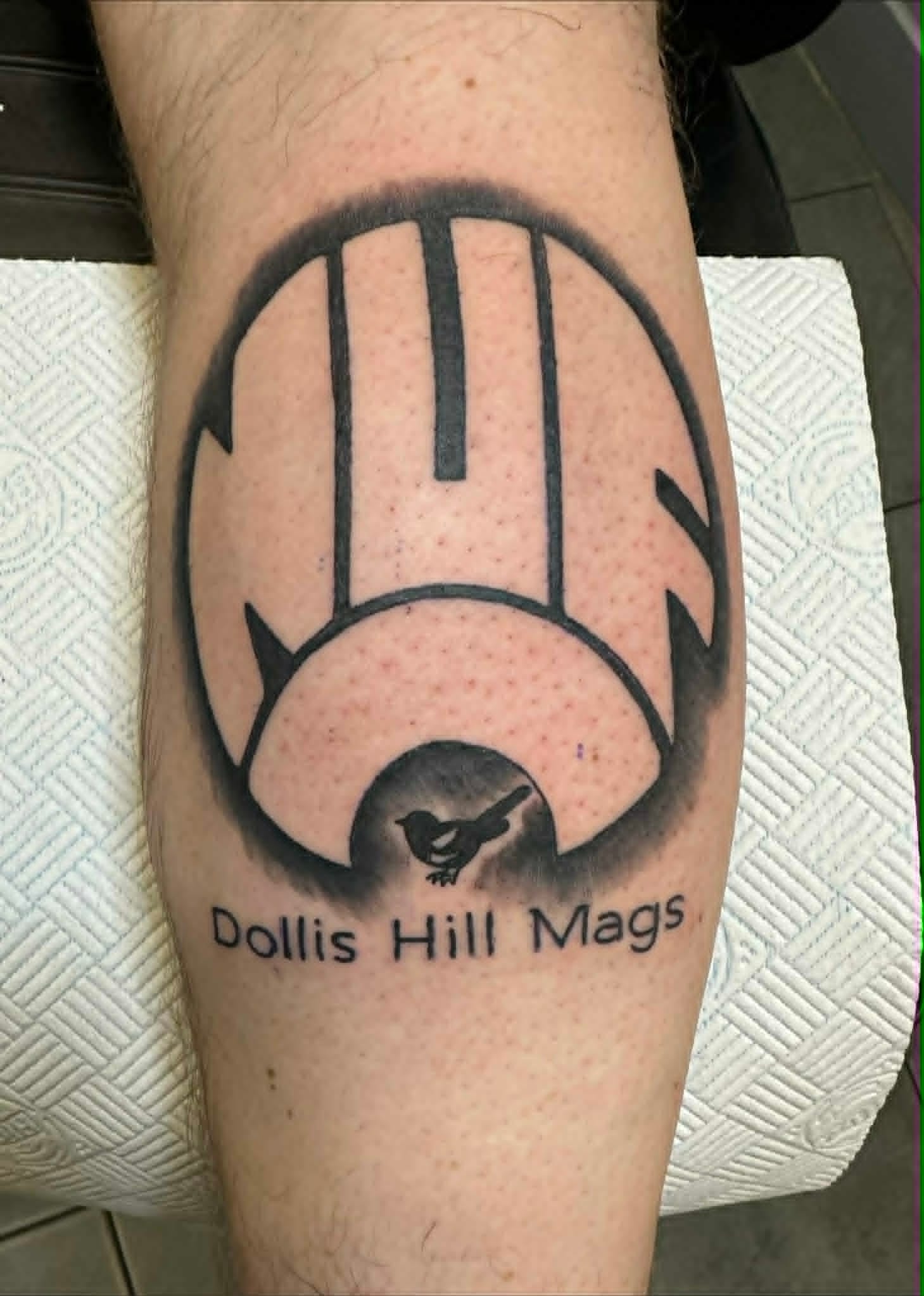 Newcastle United NUFC monogram and magpie Dollis Hill Mags calf tattoo by John Quinn at Tattoo Zone, tattoos Newcastle.