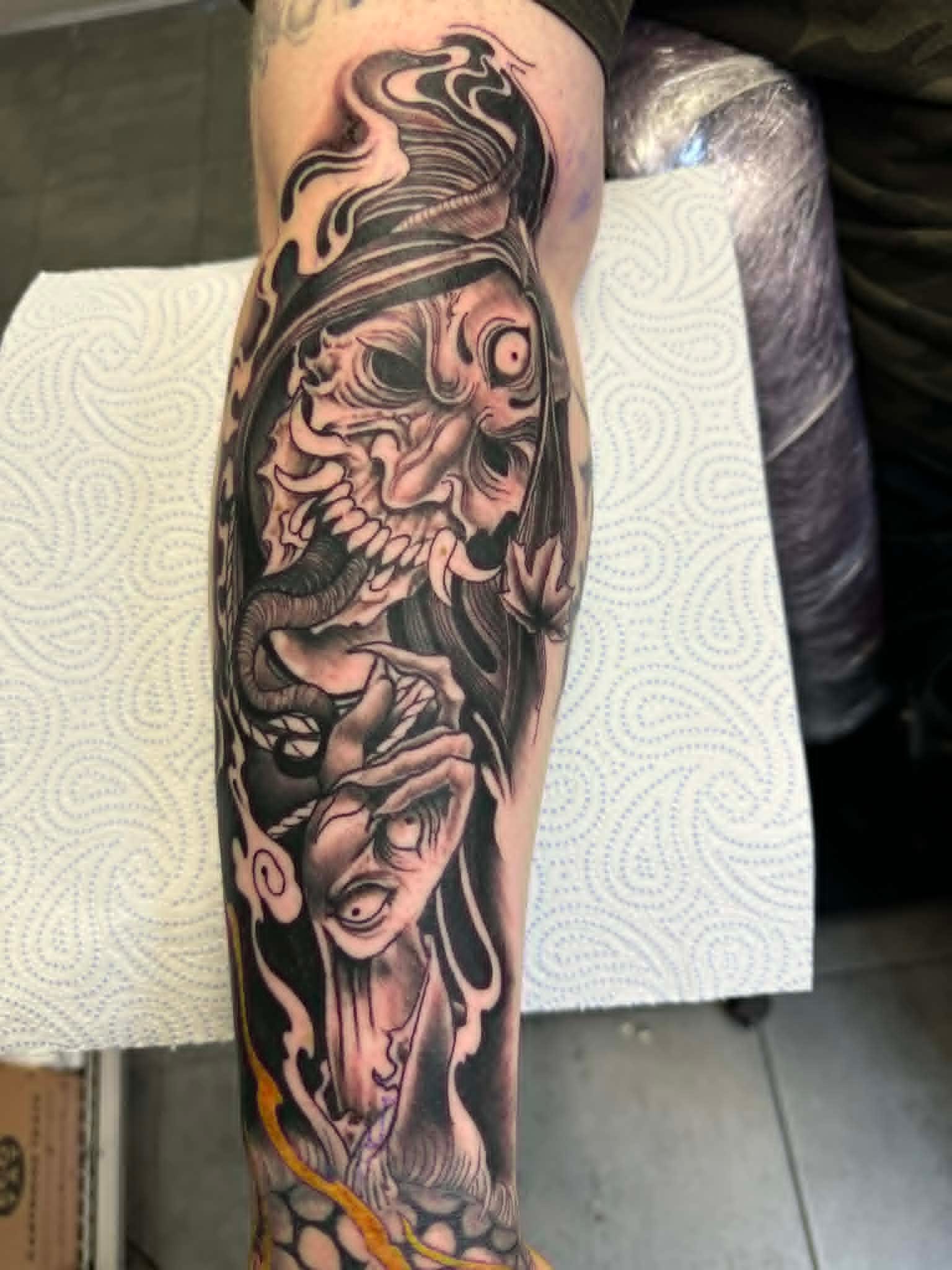 Black and grey oni demon and ghost forearm sleeve by John Quinn at Tattoo Zone, tattoos Newcastle.