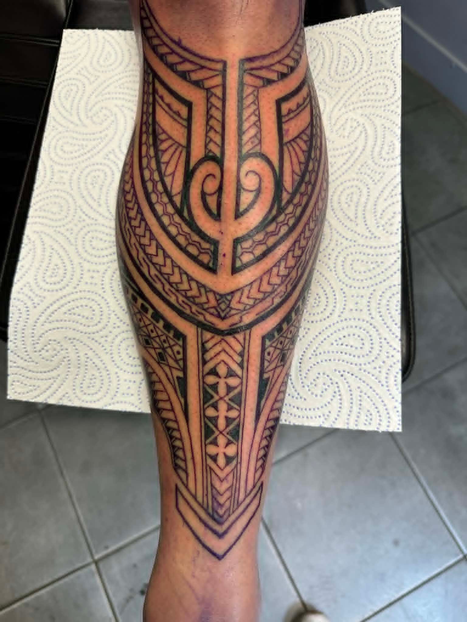 Custom Polynesian tribal pattern tattoo on the calf by John Quinn at Tattoo Zone, tattoos Newcastle.