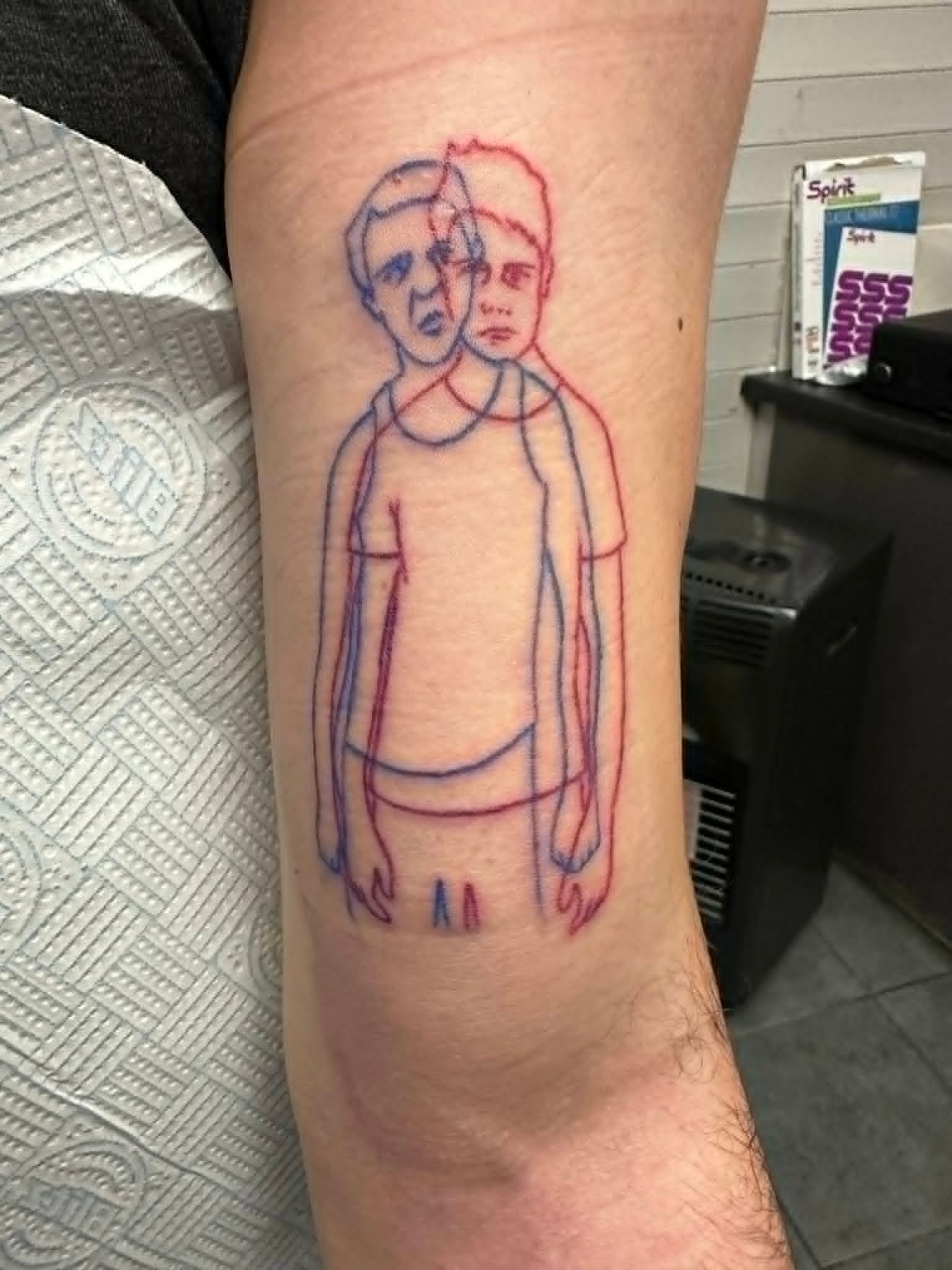Fine line red and blue two headed boy figure arm tattoo by John Quinn at Tattoo Zone, tattoos Newcastle.