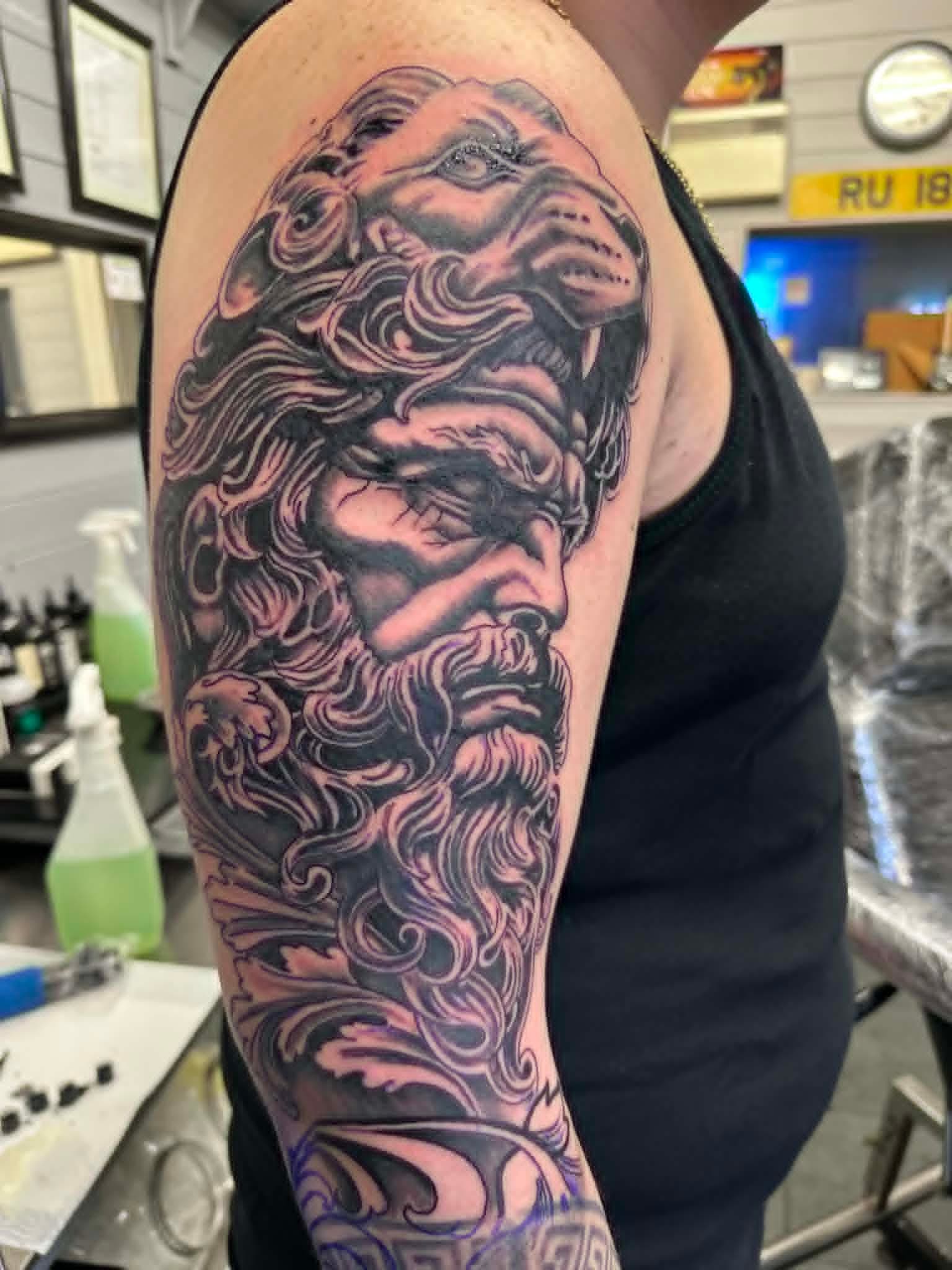 Black and grey shaded tattoo by John Quinn at Tattoo Zone Newcastle.
