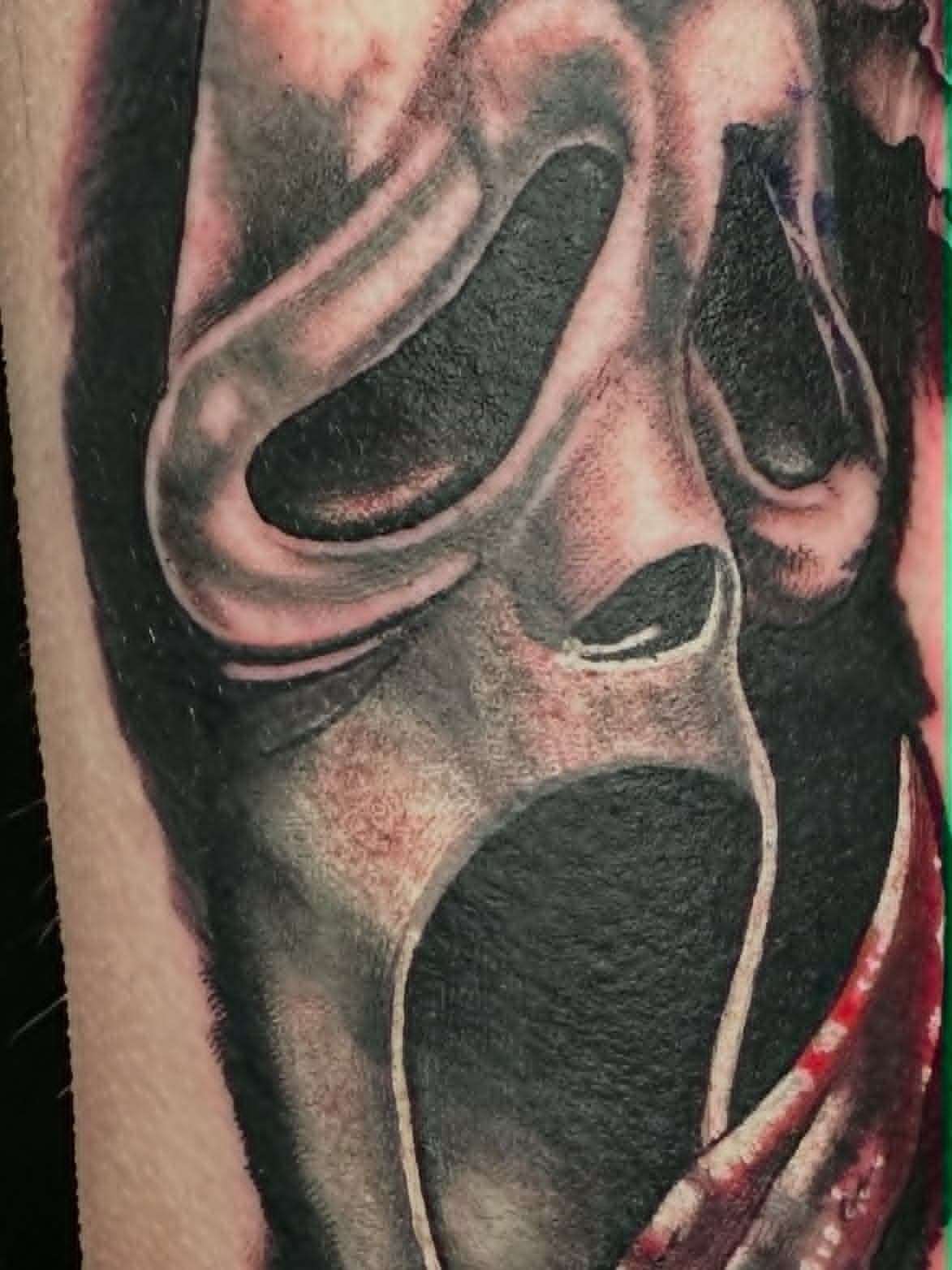 Realistic Ghostface Scream mask portrait on leg by John Quinn at Tattoo Zone, tattoos Newcastle.